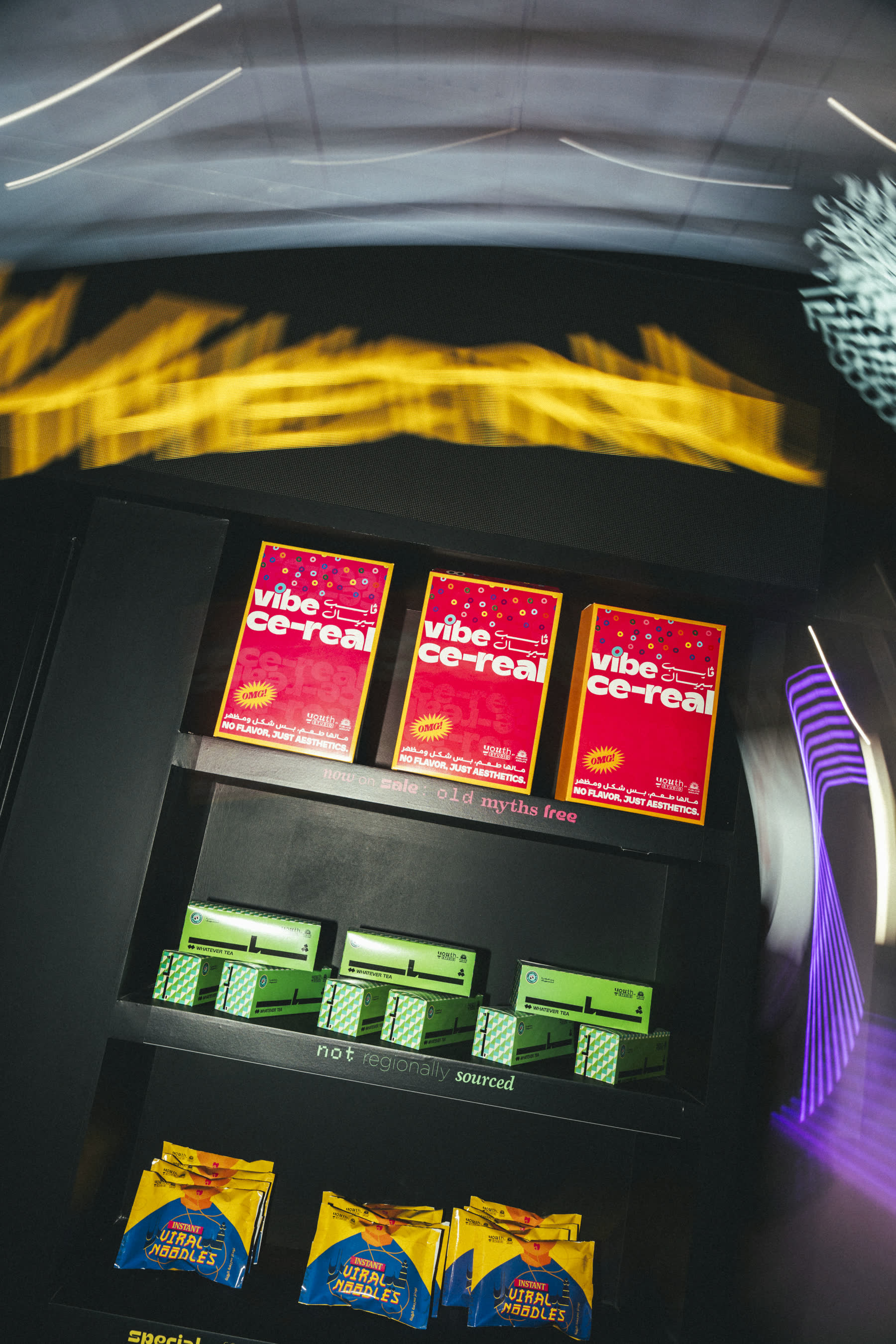 Close-up of the Myth Market shelves with cereal boxes and noodle packs
