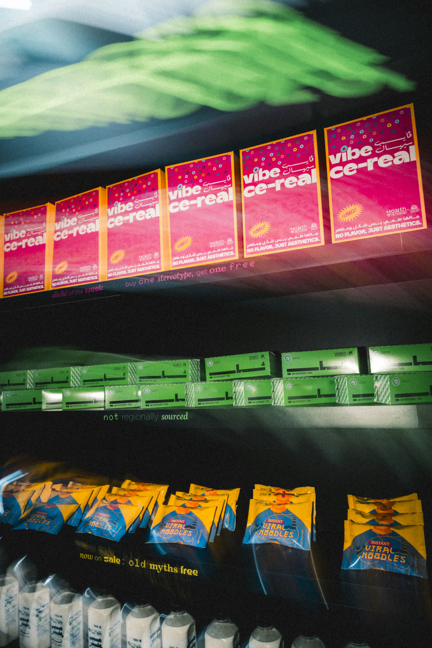 The Myth Market shelves at Athar, stacked with Vibe Ce-real boxes and Literal Noodles packs